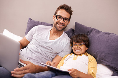Buy stock photo Portrait, father and child with laptop or tablet in bed for connectivity, technology and streaming online for news. Family, man and young boy at home with computer, movie  or cartoon for bonding