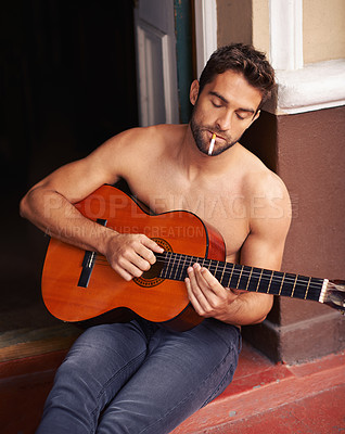 Buy stock photo Guy, guitar or home to relax as inspiration, thinking or idea of future, smoking or vision on break. Man, shirtless or cigarette as musical instrument to remember, chill or rest at weekend getaway