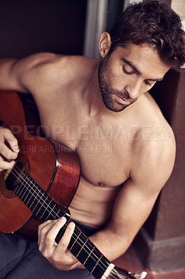 Buy stock photo Guitar, play or man in home for music, performance or entertainment with sound, rhythm or talent. Learning solo, topless artist or creative male musician with an instrument for practice routine alone
