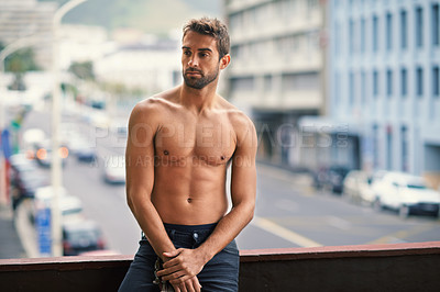 Buy stock photo Man, sexy and shirtless with muscle on balcony with confidence or pride, relax and thinking on vacation in morning. Male person, topless and strong in city with abs, fit and outside in San Francisco