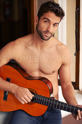 Buy stock photo Portrait, home and guitar with man, shirtless and muscular with talent and hobby with musician. Face, person and apartment with guy or string instrument for practice or training with sound or topless