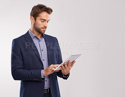 Buy stock photo Business man with tablet, technology or corporate communication isolated on studio background. Internet, connectivity or networking professional, male worker or check email for career on mockup space
