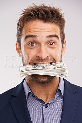 Buy stock photo Portrait, business and man with cash in his mouth, financial and prize on white studio background. Face, accountant and trading with employee biting money or entrepreneur excited with bonus or salary