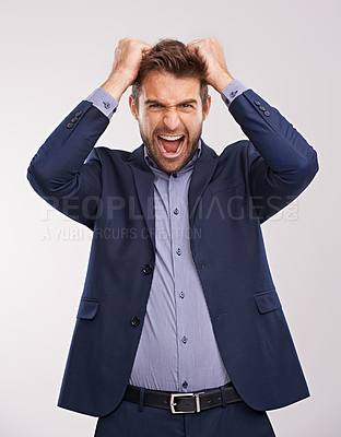 Buy stock photo Entrepreneur, man and stream or angry in studio white background with frustration, anger and upset. Portrait, businessman and hands in head to shout or furious with company deadline in suit.