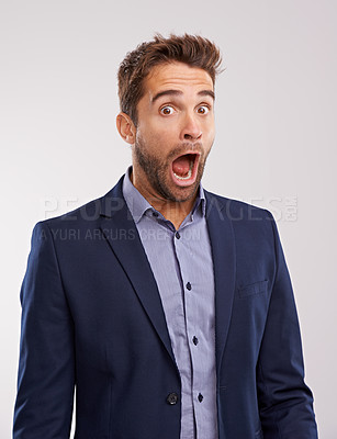 Buy stock photo Studio portrait of a handsome man with an astonished expression