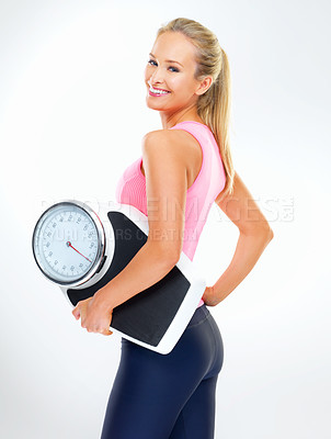 Buy stock photo Woman, portrait and scale in studio for measurement, smile and excited for results of diet or detox. Female person, body and care for calories burned target or goals, weight loss and white background