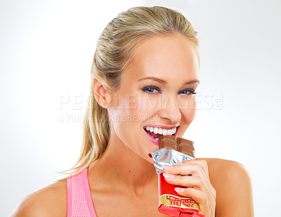 Buy stock photo Portrait, chocolate bar and woman with wellness, candy and unhealthy snack on white studio background. Fitness, person or model with cocoa product or eating a cheat day treat with diet plan and sugar