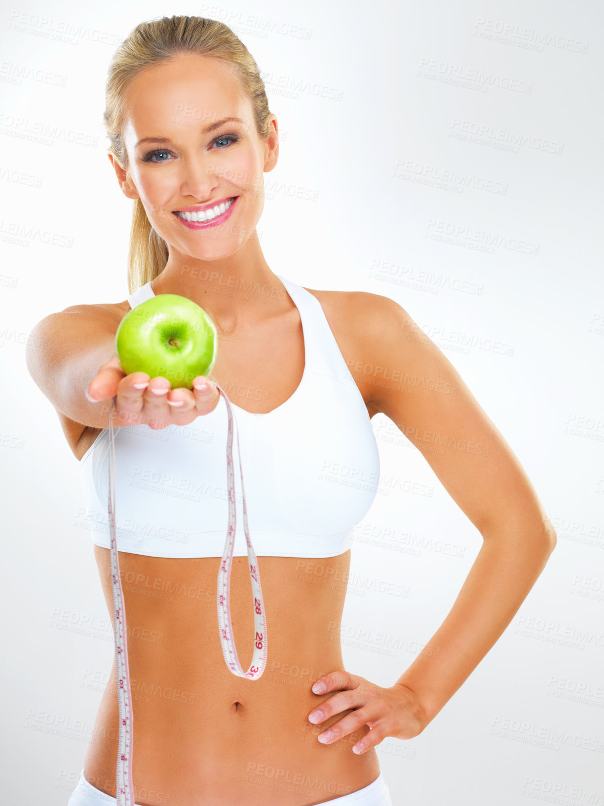 Buy stock photo Happy, tape measure and portrait of woman with apple for detox, healthy diet or weight loss progress. Studio, fruit and person with smile for nutrition, body care and wellness on white background
