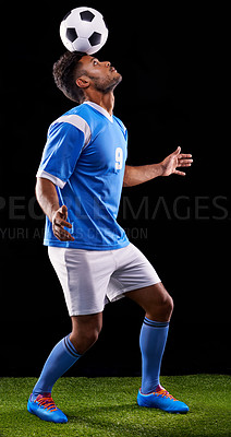 Buy stock photo Man, soccer ball and play for balance, sport and fitness for game and active for sportswear on grass or field. Arab person or athlete and practice for strong and competitive on dark background
