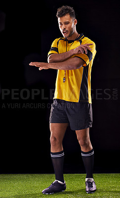 Buy stock photo Man, referee and sport for soccer, rules and game for active and sportswear on grass or field. Arab person, sportsman or athlete with kit and practice for strong and competitive on dark background