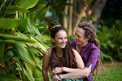 Buy stock photo Nature, hipster and couple hugging in garden on outdoor romantic date together for bonding. Smile, love and happy rasta young man and woman laughing and embracing with care in park or field.