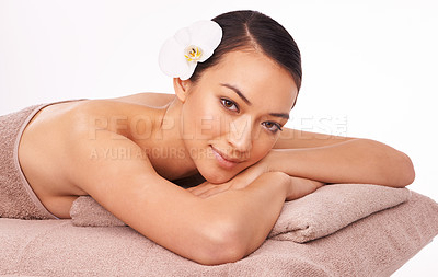 Buy stock photo Woman, smile and portrait for massage and relax in spa for wellness and skincare for body, detox and luxury. Model or young person and rest on table for break, care and beauty for holiday and calm