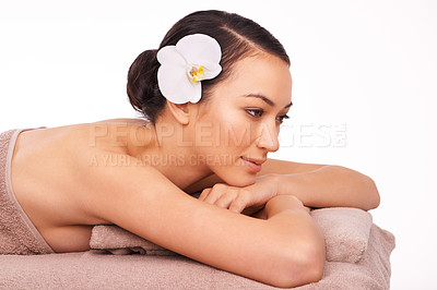 Buy stock photo Spa, wellness and white background of woman for massage, relax or luxury treatment for stress relief. Natural, skincare and female person with flower for zen, self care and detox in studio backdrop
