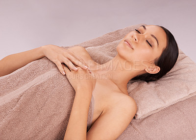 Buy stock photo Spa, massage and calm with woman, wellness and peaceful lady isolated on beige studio background. Person, mockup space and person with vacation and stress relief with hospitality industry and holiday