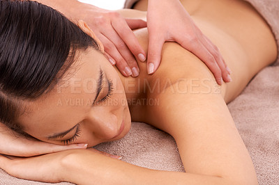 Buy stock photo Woman, relax and spa for massage, wellness and skincare for body, treatment and detox for luxury. Model or young person and rest for touch on towel for break, care and beauty for holiday and calm