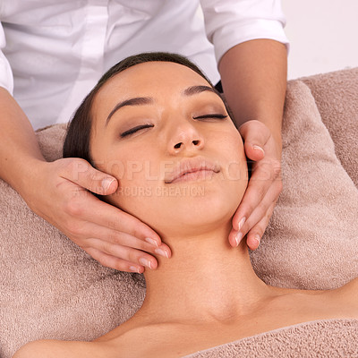 Buy stock photo Shot of a beautiful young woman enjoying a relaxing massage