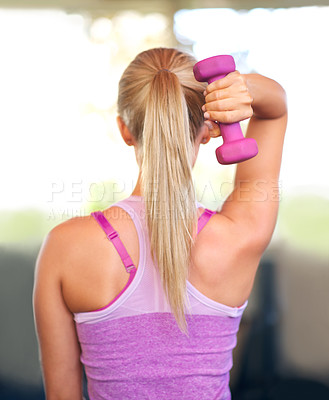 Buy stock photo Fitness, workout and woman with dumbbell in gym for exercise, arm strength and bodybuilding wellness. Female person, muscle and back with equipment for power training, weightlifting and healthy body