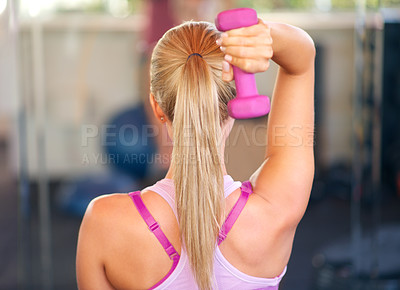 Buy stock photo Training, woman and workout with dumbbell in gym for fitness, arm strength and healthy body wellness. Female person, muscle and back with equipment for power exercise, weightlifting and bodybuilding