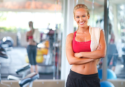 Buy stock photo Woman, portrait and arms crossed for exercise in gym, health and wellness with workout. Smile, training and sport with athlete at fitness club, endurance and performance with challenge and towel