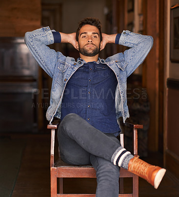 Buy stock photo Thinking, thoughtful and male person on chair, living room or home for relax. Face, confident and hand behind head for handsome young man, calm and fashionable people in countryside for holiday