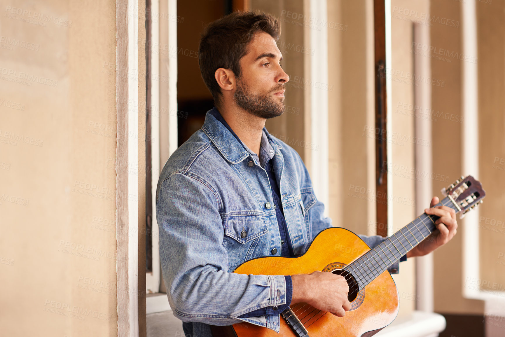 Buy stock photo Guitar, music and instrument for thoughtful male person, outside on patio or veranda. Acoustic, singer and talent for man musician for entertainment, enjoyment and pensive on holiday or vacation 