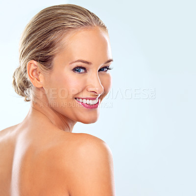 Buy stock photo Happy, skincare and portrait of woman in studio for facial treatment, dermatology and cosmetic glow. Female person, smile and confidence with healthy skin, self care and wellness on blue background