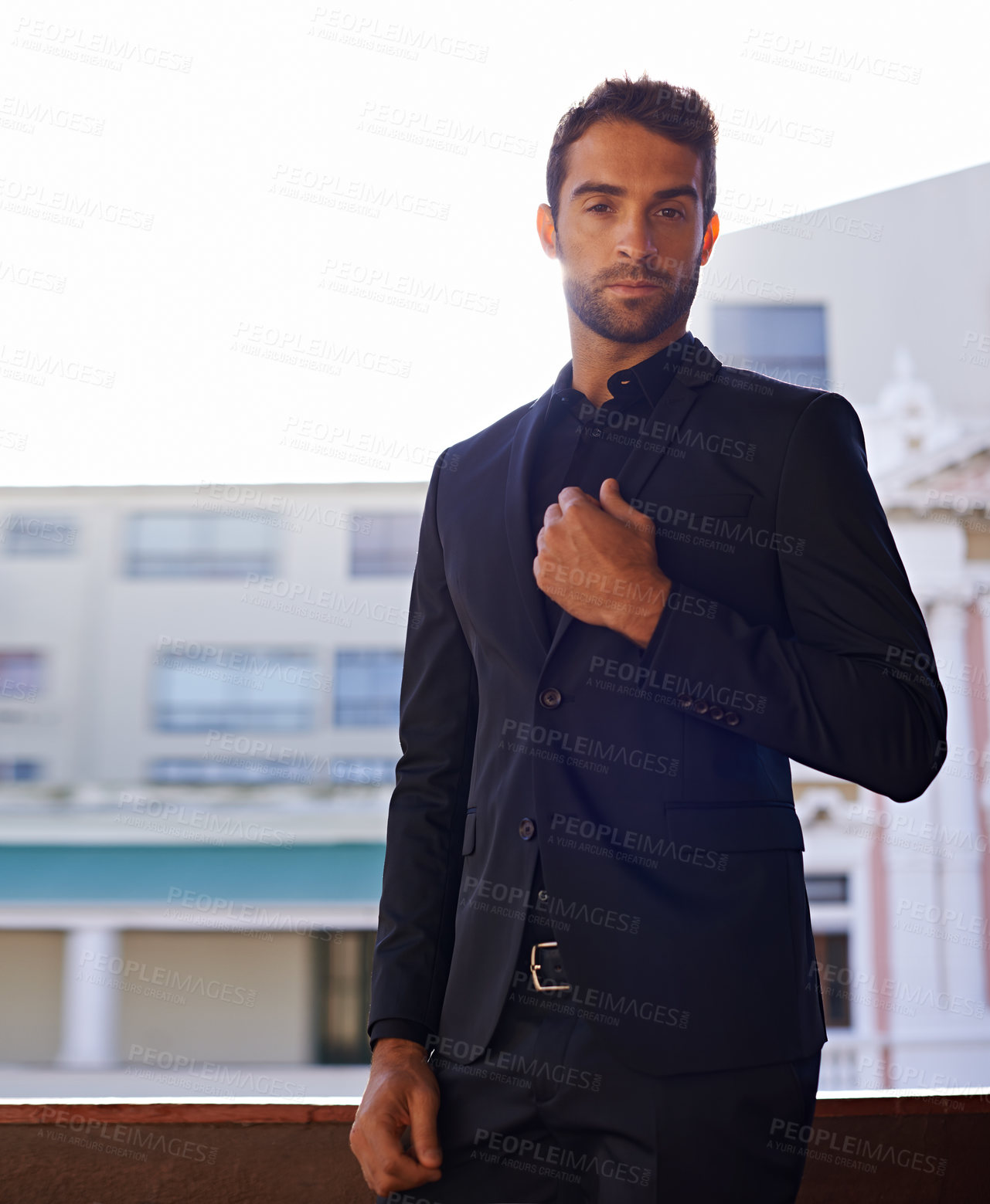 Buy stock photo Portrait, confident and businessman on balcony in suit and formal fashion for professional in city. Real estate agent, face and pride of entrepreneur in property, job and ambition of friendly realtor