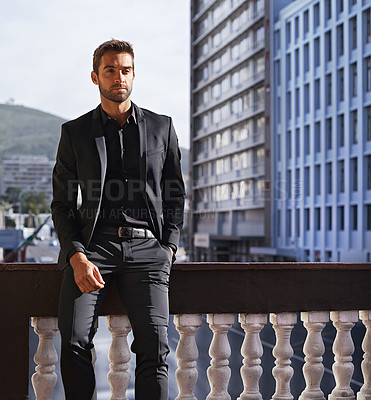 Buy stock photo Portrait, style and businessman on balcony in suit and formal fashion for professional in city. Real estate agent, face or confidence of entrepreneur in property, job or ambition of friendly realtor