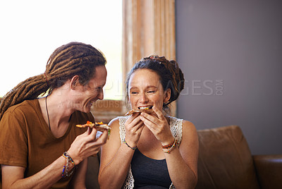 Buy stock photo Food, happy and love for couple, couch and living room in home. Dreadlocks, smile and eating pizza for romance and affection on weekend, house or lounge or partner together for bonding on holiday