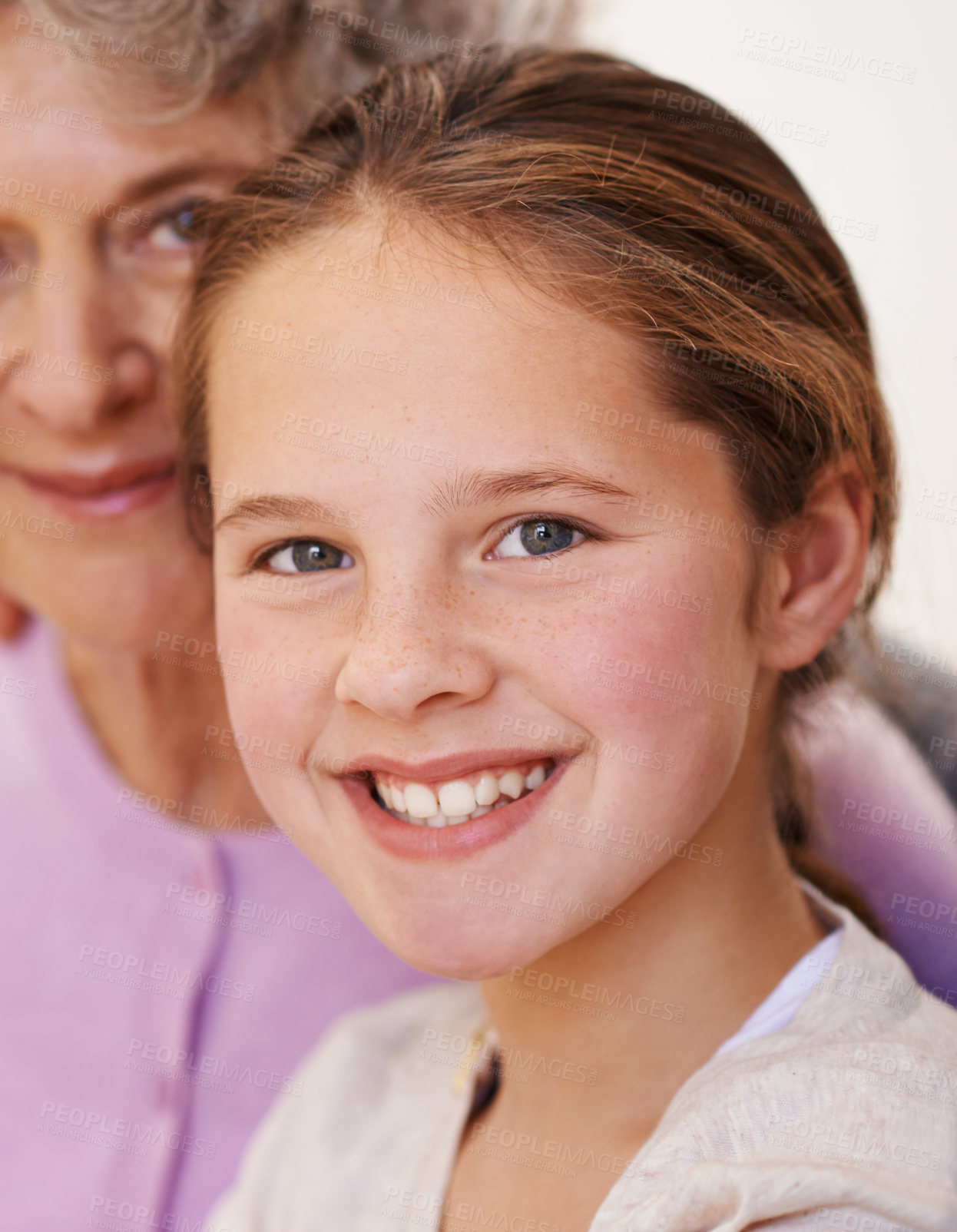 Buy stock photo Portrait, grandma and girl with smile in house, senior and woman babysitting granddaughter in home. Living room, elderly female person and child in lounge with happiness, love and bonding together