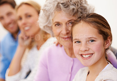 Buy stock photo Portrait of a cheerful multi generational family smiling together