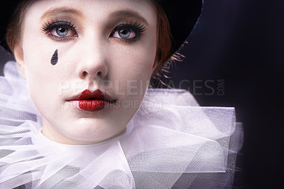 Buy stock photo Face, woman and magician performer in studio on black  background with creative makeup for entertainment, artist and passion. Portrait, female person and outfit to perform tricks or jokes at circus