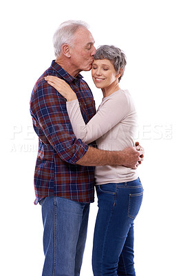 Buy stock photo Kiss, hug and senior couple on a white background for bonding, affection and loving relationship. Marriage, happy and mature man and woman embrace for commitment, love and care in studio together