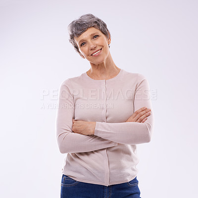Buy stock photo Senior woman, portrait and arms crossed in studio with smile, happiness and confidence on isolated white background. Retirement, fashion and elderly female person for aesthetic, style and clothing