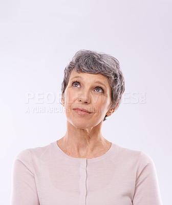Buy stock photo Thinking, idea and senior woman in studio with mockup for faq, brainstorming or promo on white background. Questions, planning and old lady model curious about announcement, information or deal offer