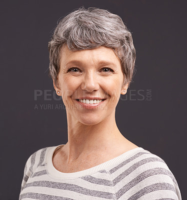 Buy stock photo Portrait, smile and elderly woman with retirement, peace and happiness on a grey studio background. Face, pensioner and mockup space with old person and model with confidence, calm and cheerful