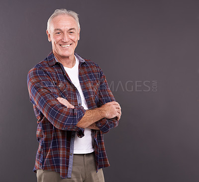 Buy stock photo Senior, space or happy man in portrait with arms crossed, confidence or fashion style on grey background. Proud person, casual model or mature guy isolated in studio with smile, clothes or mockup