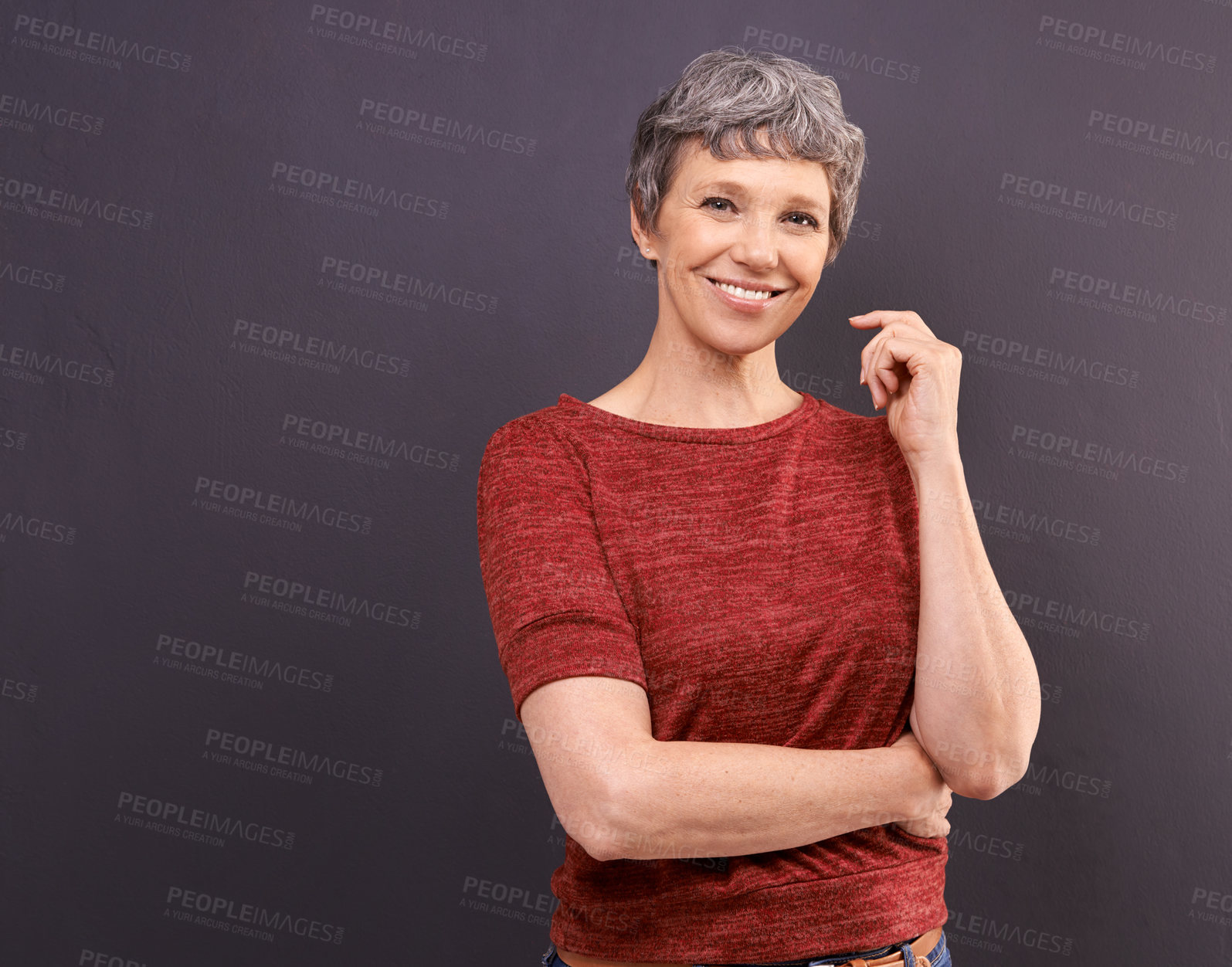 Buy stock photo Studio portrait of a confident elderly woman against a gray background