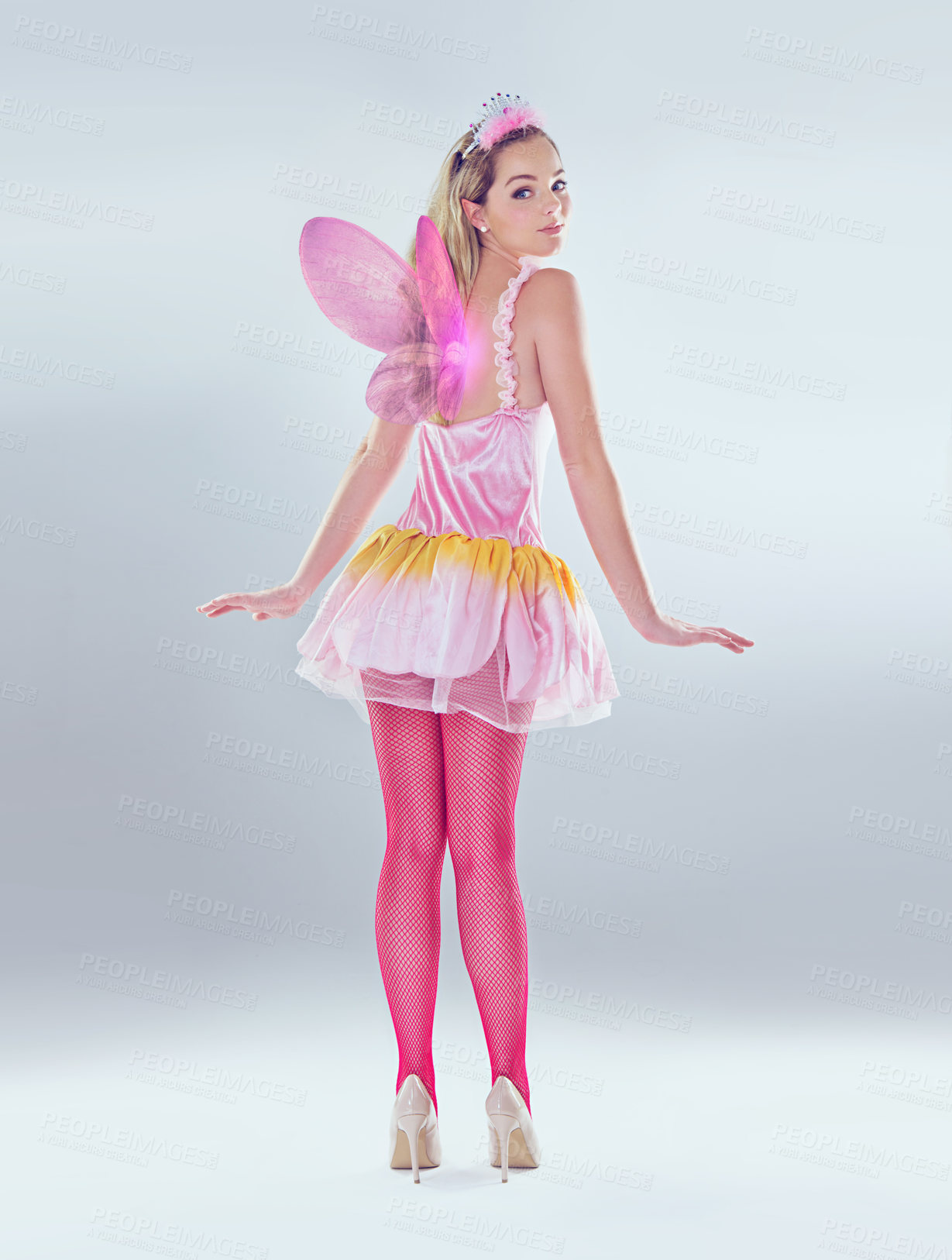 Buy stock photo Woman, costume and fairy in studio on dress with wings as angel or butterfly for fantasy and creativity on white background. Back view, female person and princess style for halloween with glitter