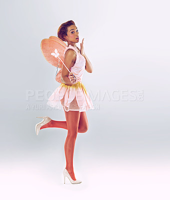 Buy stock photo Woman, fairy and ballerina for fantasy in studio portrait in wand, smile and pride by white background. Person, dancer or girl with magic, costume and butterfly wings for ballet, art and creativity