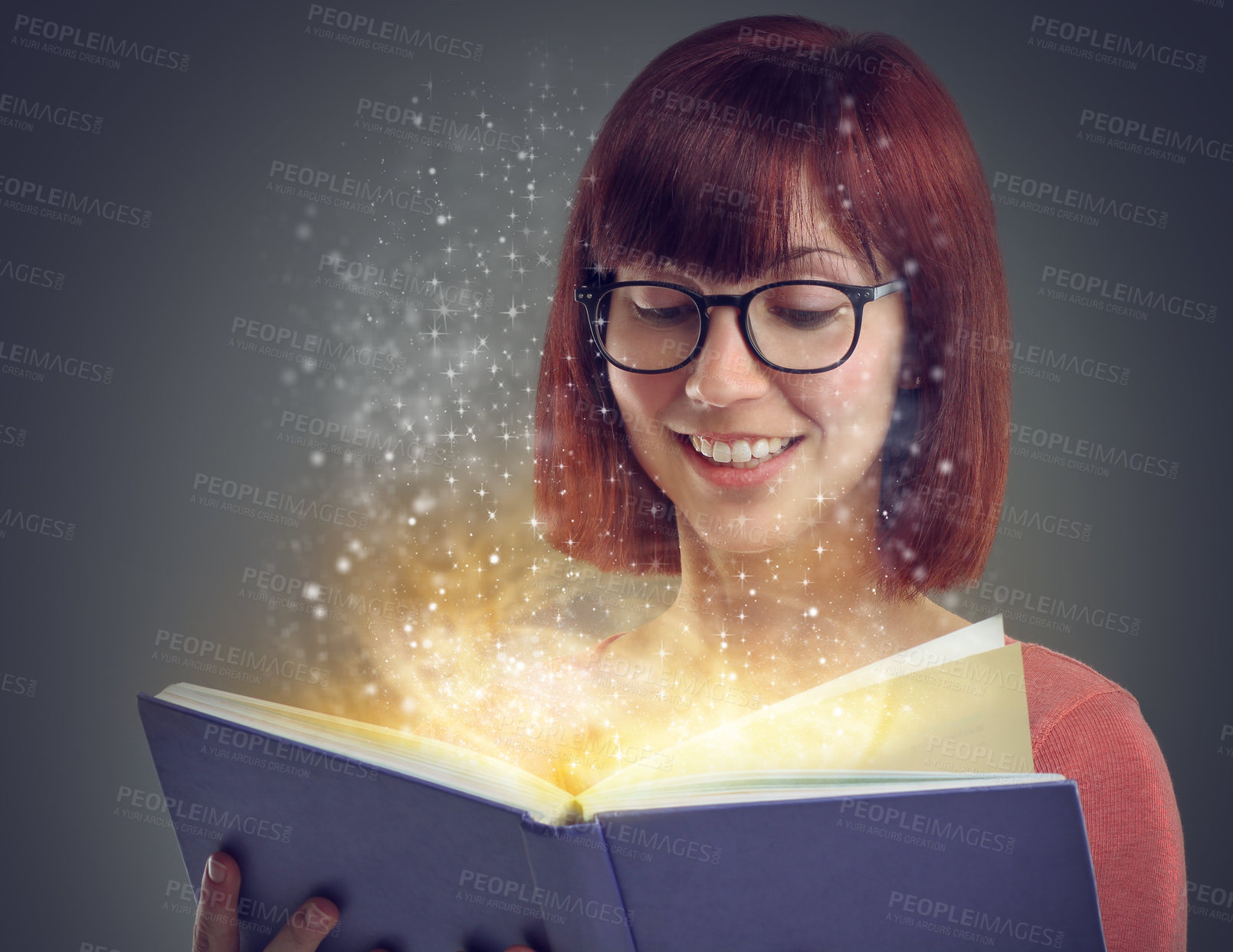Buy stock photo Glowing pages, book or woman with a story, glasses or education on grey studio background. Person, reader or girl with a novel or literature with knowledge or eyewear with fantasy, smile or astrology
