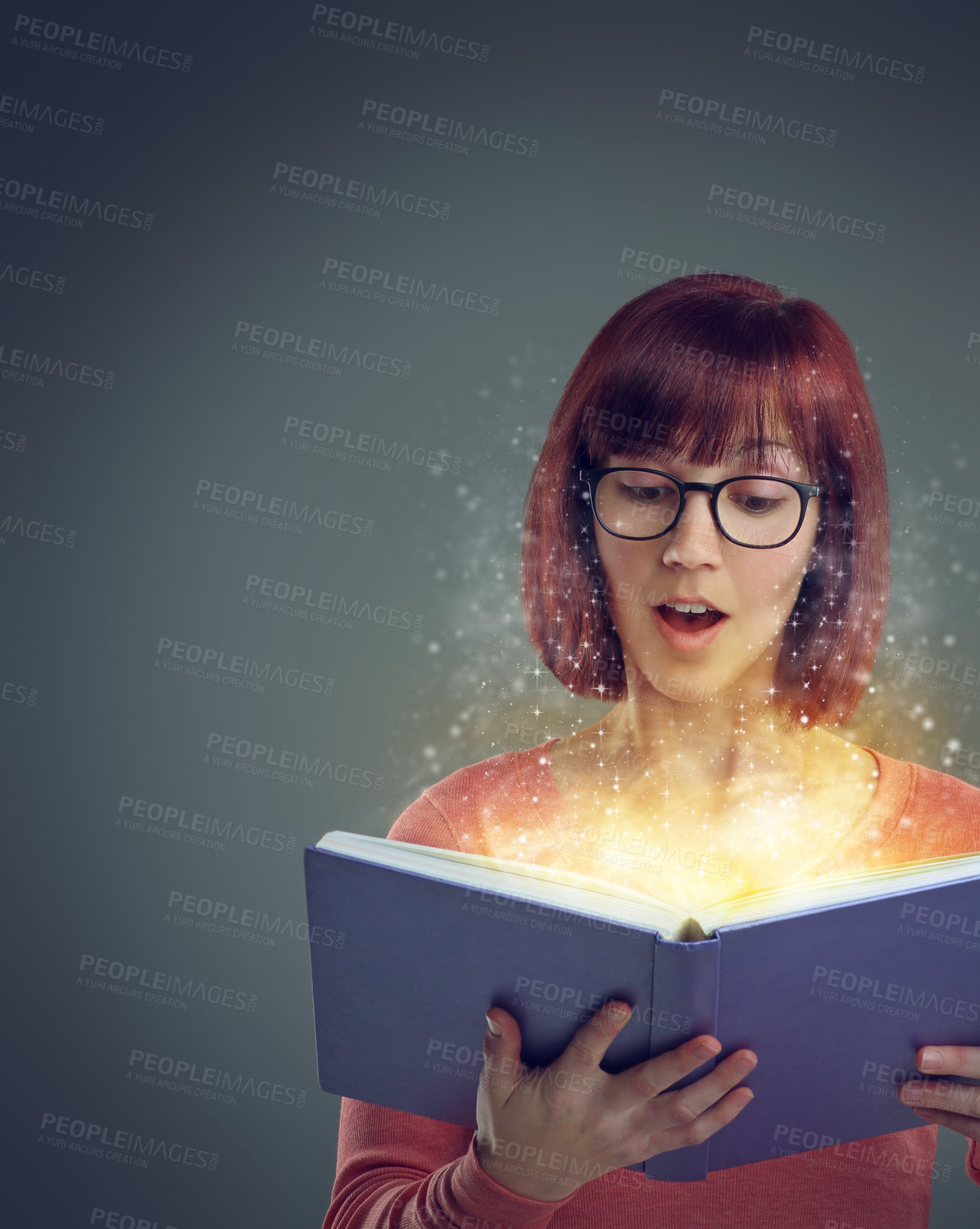 Buy stock photo Woman, book and read for story, fairytale and wow facial expression for glowing and sparkle on mockup. Young person and shocked with glasses for omg, surprised and interesting for magic and fiction