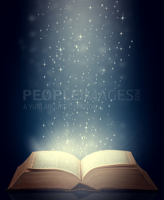Buy stock photo Shot of an open storybook with light emanating from it
