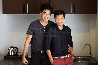 Buy stock photo Happy, Asian and portrait of a gay couple with a hug, care and bonding in a home kitchen. Smile, lgbtq love and men together in a house to relax with an embrace and affectionate in relationship