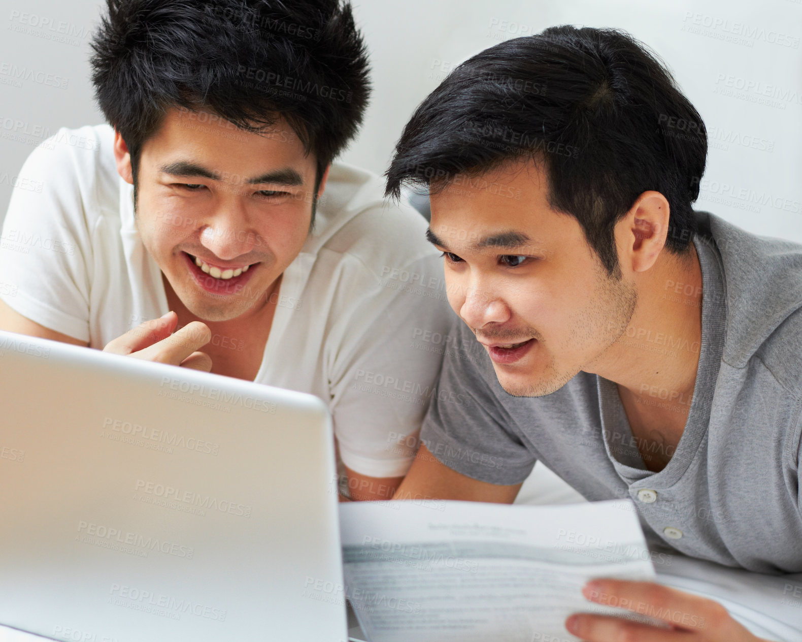 Buy stock photo Smile, email and a gay couple with a laptop for bills, insurance or mortgage payment at home. Happy, bedroom and Asian men reading information to pay a loan with online banking on a computer