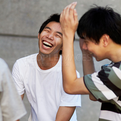Buy stock photo Friends, laughing and portrait of asian teenager with happiness, freedom and funny conversation on weekend or holiday. Joke, comedy and smile on face of Japanese teen boy or college student in group