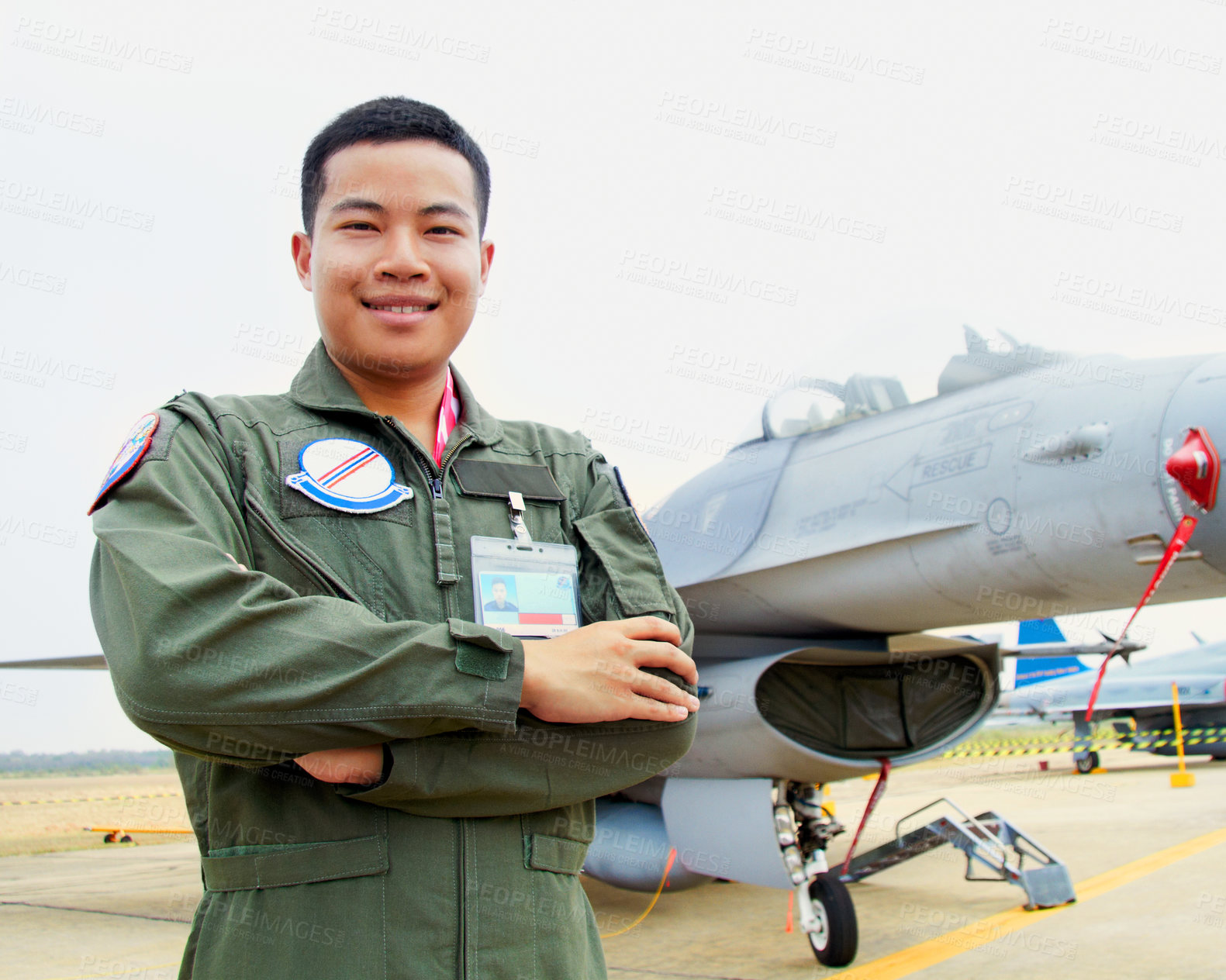 Buy stock photo Portrait of asian man, fighter pilot with jet and confident smile at airforce base with arms crossed in Korea. Freedom, transport and proud Asian soldier with airplane, confident and service in army.