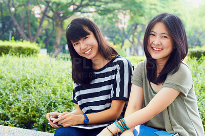 Buy stock photo University, nature and portrait of girl friends with scholarship sitting outdoor on campus for education. Knowledge, smile and female college students in park for fresh air studying for test or exam.