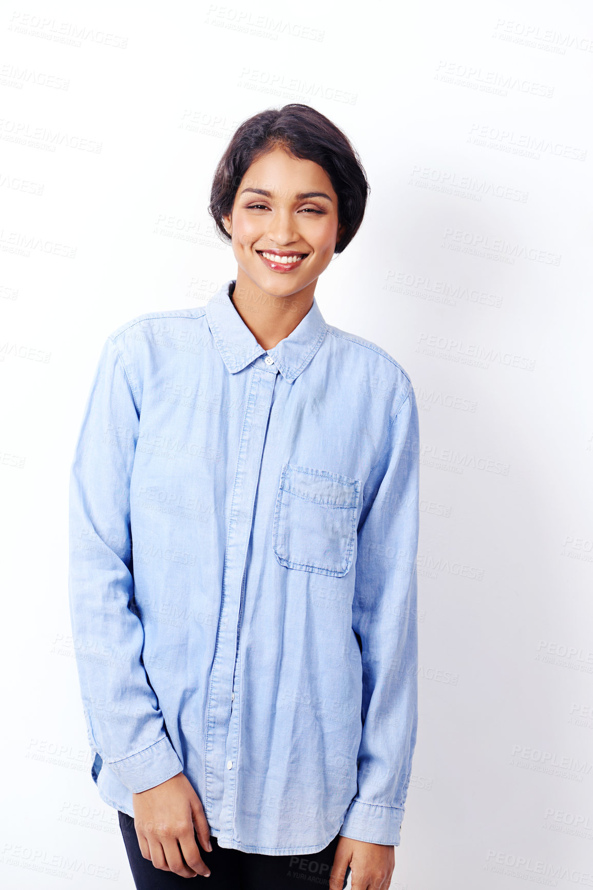 Buy stock photo Indian woman, fashion and happy in studio for portrait with denim shirt for trendy outfit by white background. Isolated girl, person and model with smile for casual style in edgy clothes in Mumbai