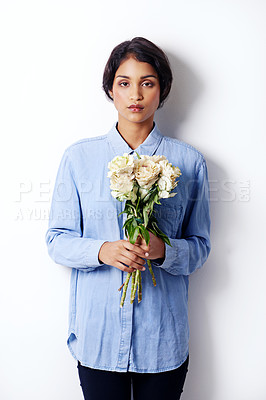 Buy stock photo Flowers, bouquet and portrait of indian woman in studio, romantic and floral gift for valentines day. Person, face and serious with roses as present of love, plants and florist by white background